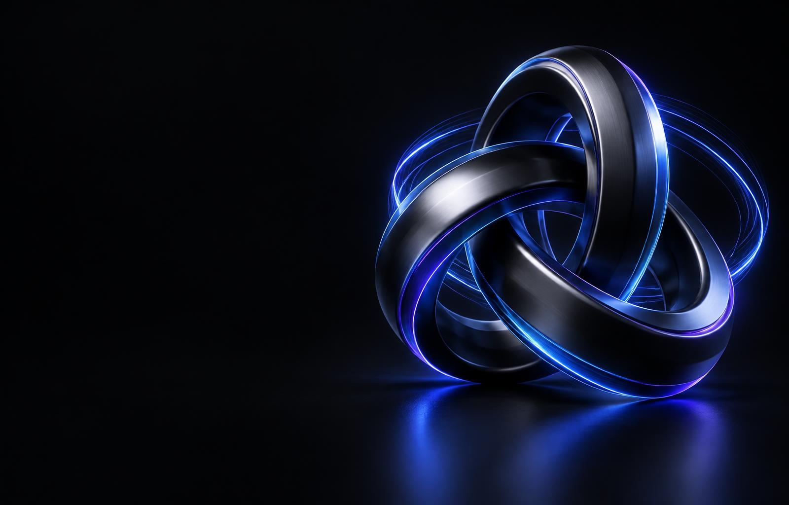 Sculptural graphite rings illuminated by electric blue light